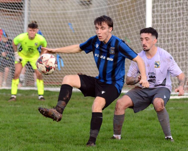 Liam Parks - shields the ball in the Hakin v Monkton Swifts top of the table clash. Picture Gordon Thomas